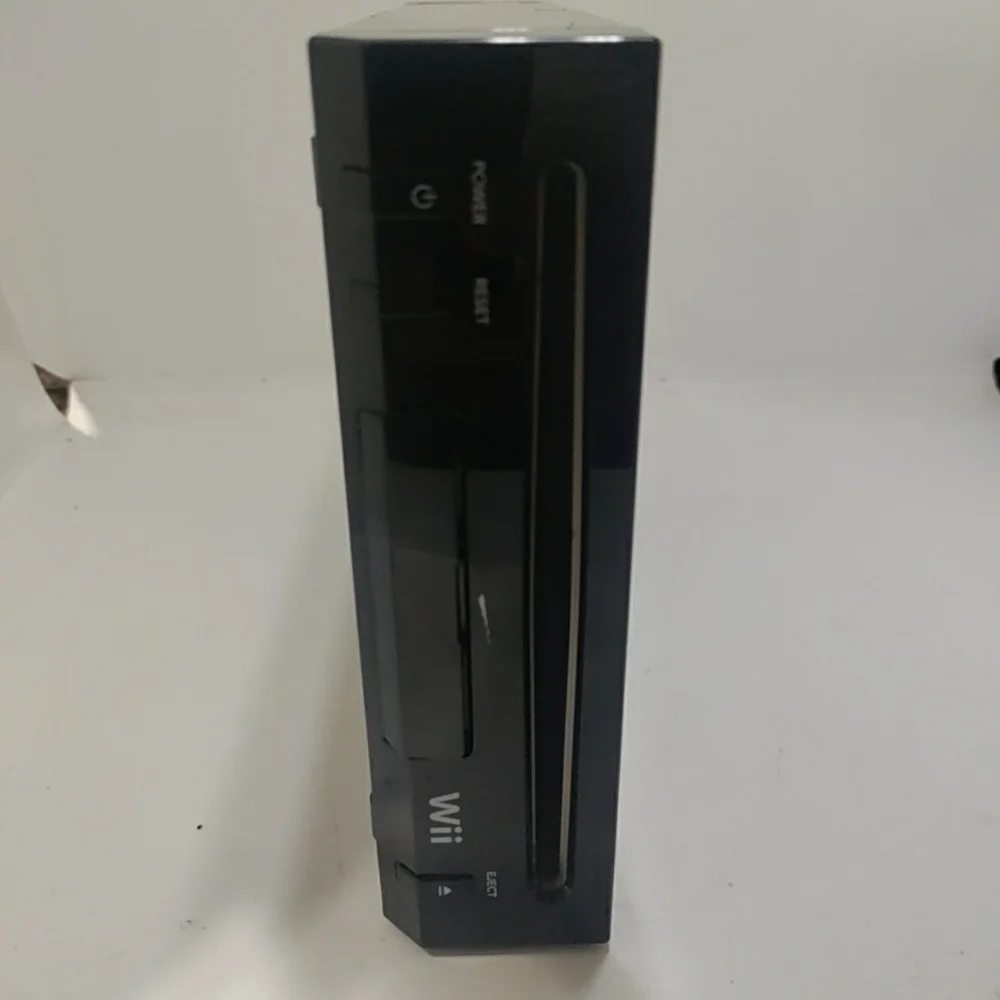 Nintendo Wii Black Console with AV cord, plug and bar used.. Tested the Nintendo